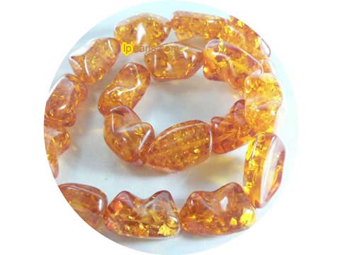 5 pieces 15mm cognac shoes shape amber strand on wholesale