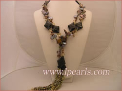 dazzling long pearl necklace with rhombic wavy gemstones