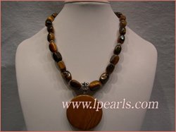 tiger eye jewelry necklace with a round gemstone pendant