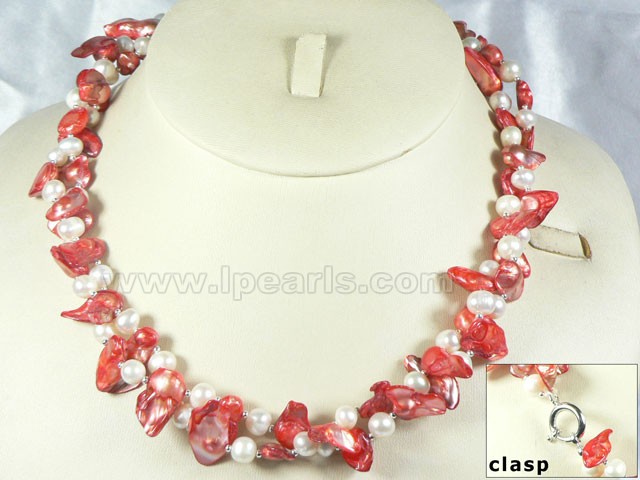 Two twisted strands red and white blister pearl necklace