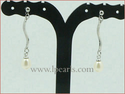 white freshwater oval pearl earrings