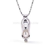 Silver plated rice pearl sneaker cage pendant