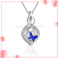 925 sterling silver CZ twist blue butterfly cage pendant