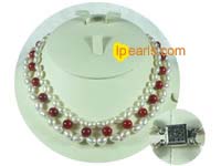 workmanlike handmade knotted pearl and coral necklace