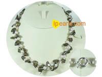 Two twisted strands champagne and white blister pearl necklace