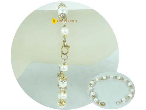 white freshwater pearl bracelet with golden color zircon