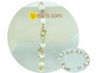 white freshwater pearl bracelet with golden color zircon