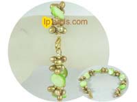 11mm green shells bracelet with 5mm champagne pearl