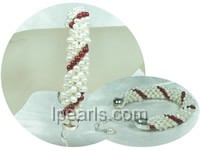 red coral and 4-5mm white potato pearl braid bracelet