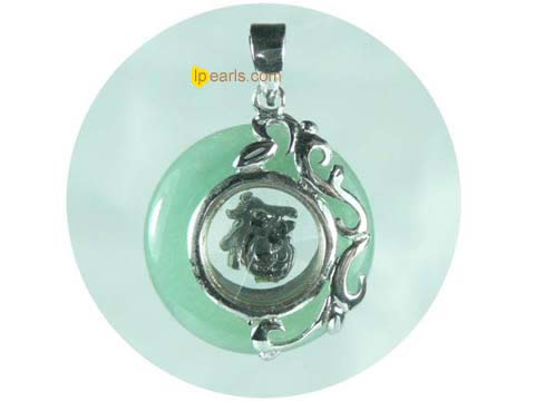 pea green donut shape jade with sterling silver mounting pendant